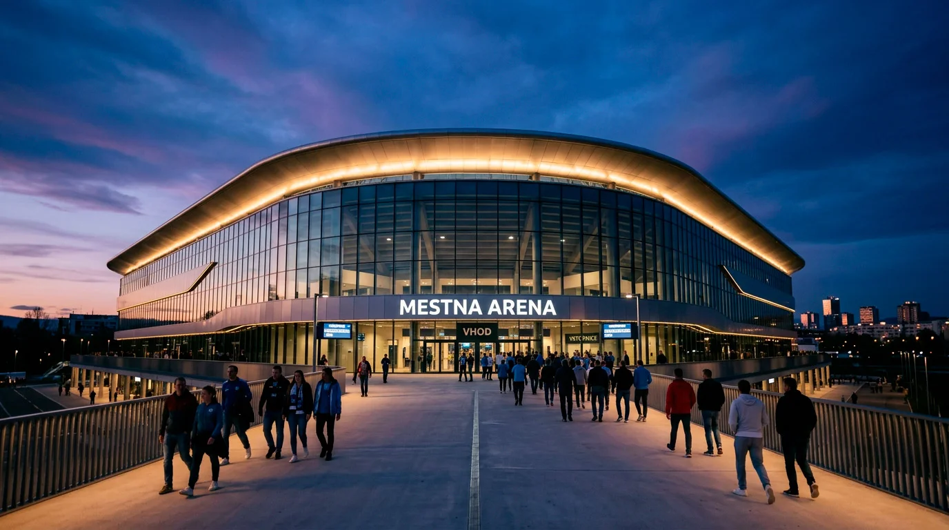 Velik ameriški nogometni stadion z osvetljeno fasado v večernem mraku pred tekmo Svetovnega prvenstva